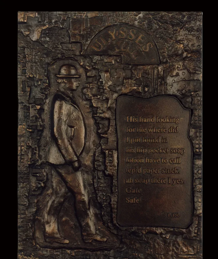 Colour photo of bronze plaque by Robin Buick
